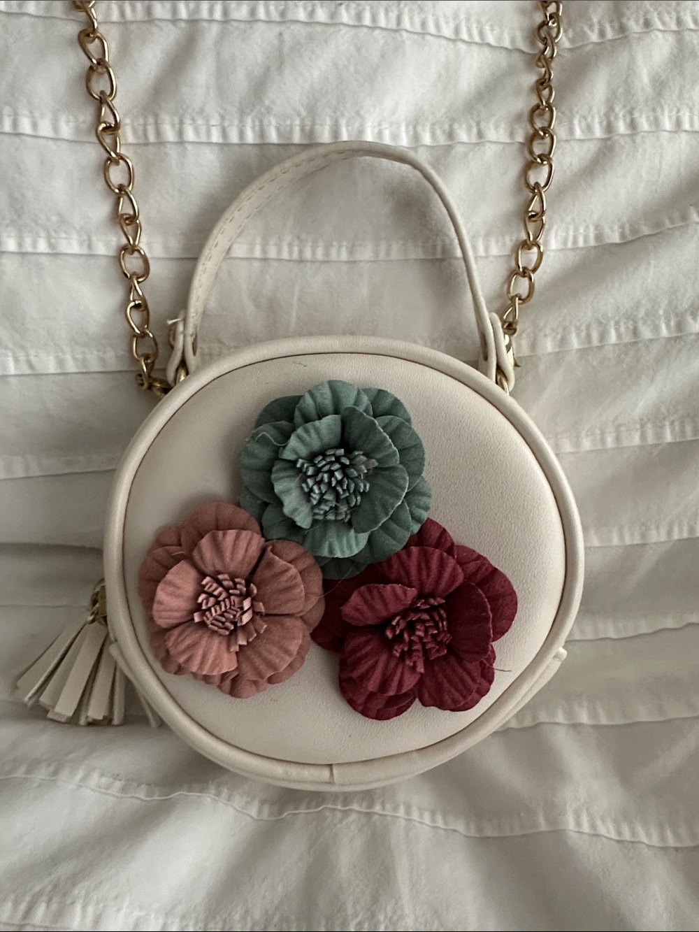 Round Cream Crossbody Bag with Floral Accent